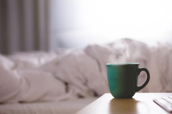 A coffee cup on a table.