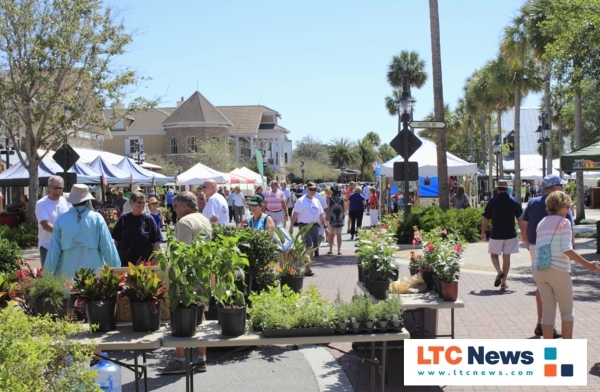 People shopping at an outdoor street market at The Villages in Florida.